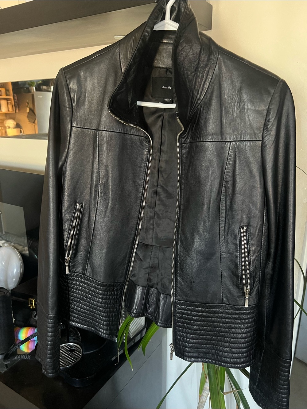 Women’s Black Leather Zip-Up Moto Jacket with Quilted Hem